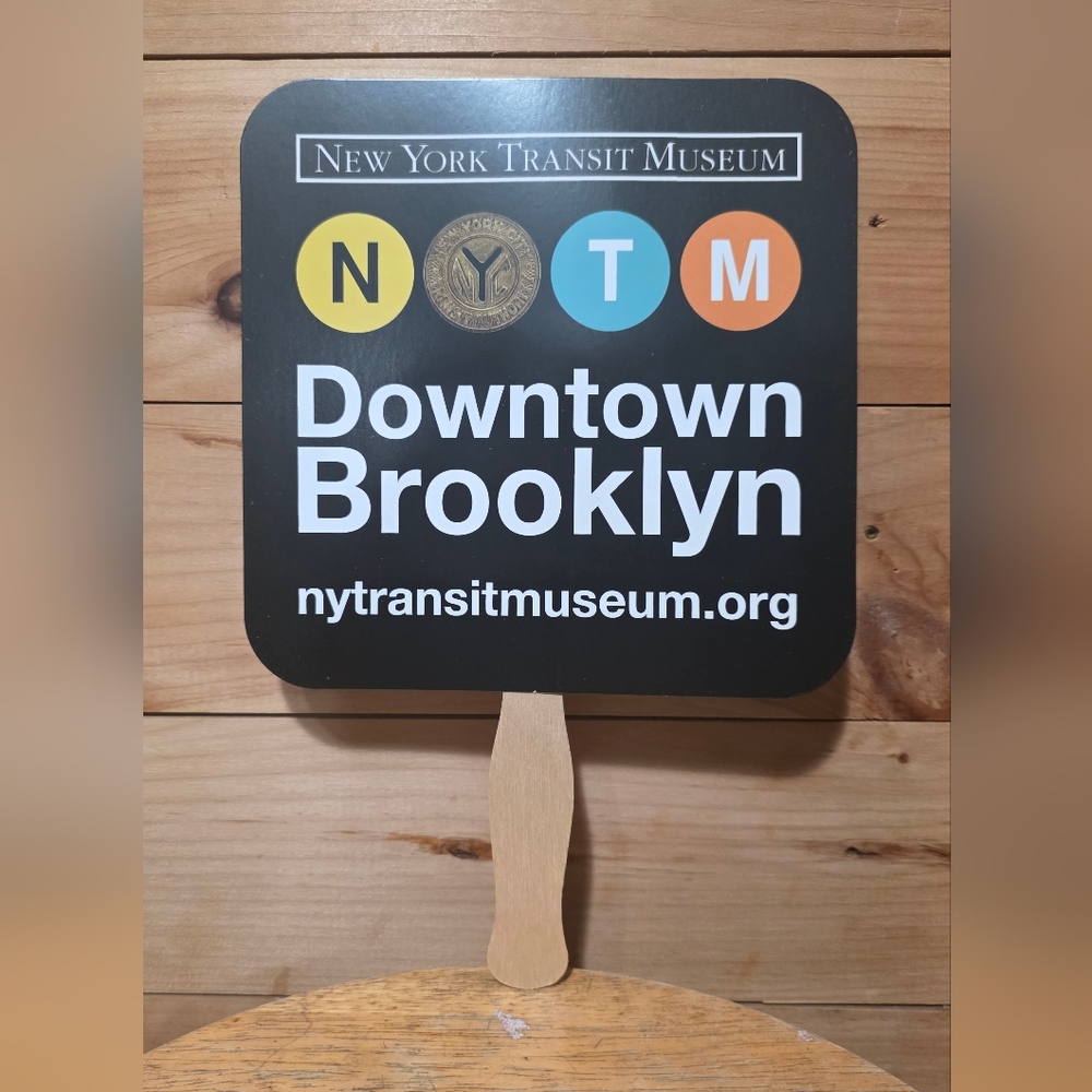 New York Transit Black Handheld Sign